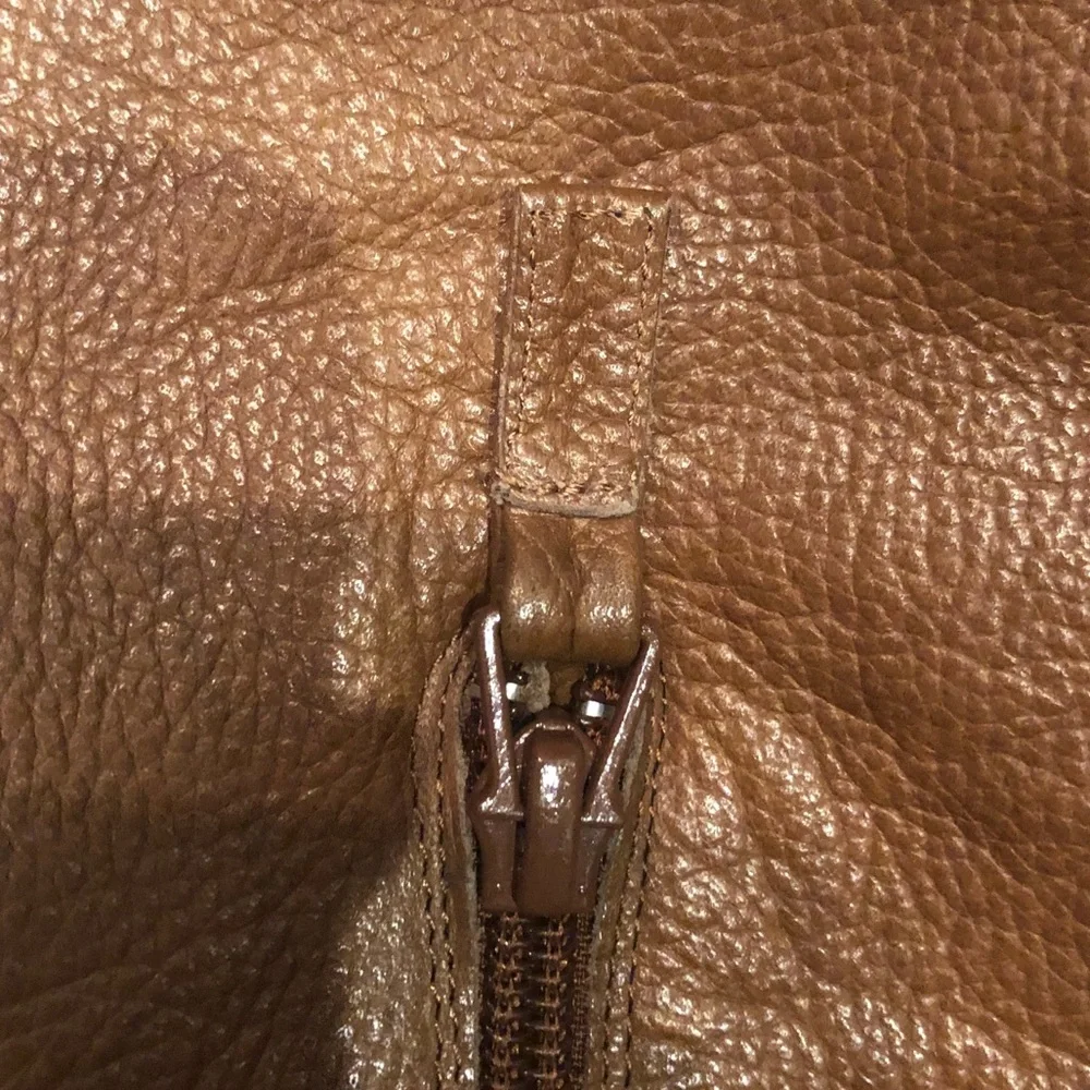 HP! Rosegold Boots in Cognac Leather with Fold Over Tops. Inside zip. Size 39.